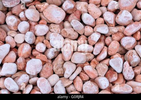 Sfondo di piccole rocce rosse Foto Stock