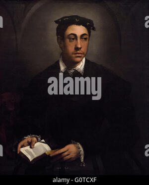 Niccolò dell'Abate (Modena 1509/12 - Fontainebleu 1571) Ritratto di una giovane uomo con il suo cane Foto Stock