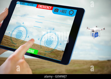 Immagine composita dell'uomo utilizzando tablet pc Foto Stock