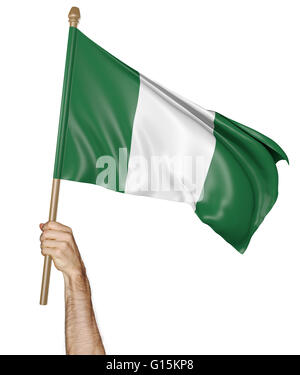Mano orgogliosamente sventolare la bandiera nazionale della Nigeria, rendering 3D Foto Stock