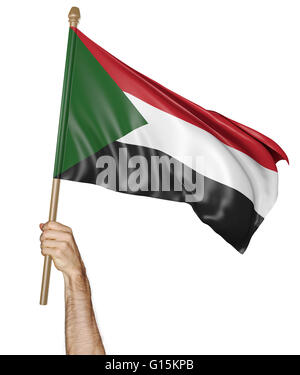 Mano orgogliosamente sventolare la bandiera nazionale del Sudan, rendering 3D Foto Stock