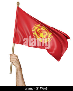 Mano orgogliosamente sventolare la bandiera nazionale del Kirghizistan, rendering 3D Foto Stock