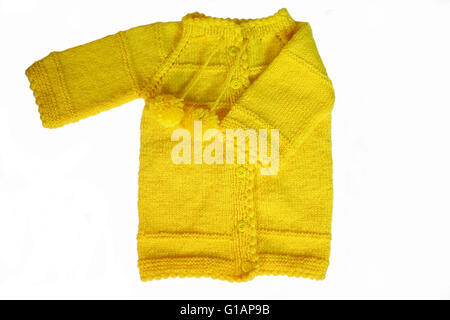 Baby cardigan su bianco Foto Stock