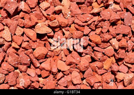 Sfondo di piccole rocce rosse Foto Stock