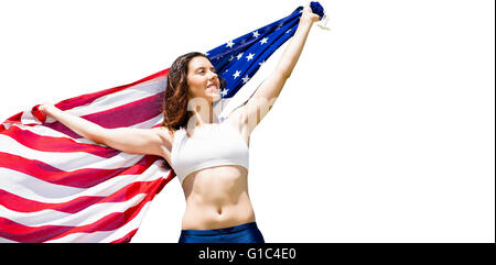 Felice sportive in posa con una bandiera americana Foto Stock