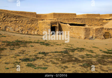 La ricostruzione di edifici, Los Millares preistorico insediamento Calcolitico sito archeologico, Almeria, Spagna Foto Stock