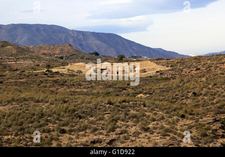 La ricostruzione di edifici, Los Millares preistorico insediamento Calcolitico sito archeologico, Almeria, Spagna Foto Stock