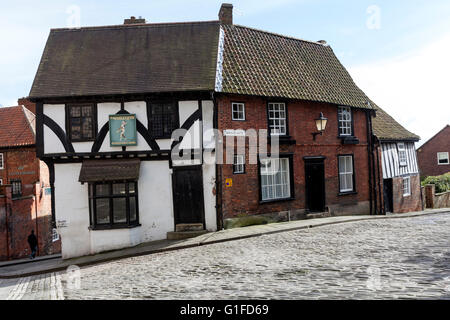 L'Arlecchino, tardo medievale incorniciata in legno casa in Michaelgate, Lincoln Foto Stock