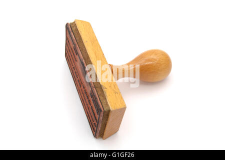 Vecchio francobollo di legno isolato su sfondo bianco Foto Stock