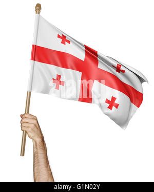 Mano orgogliosamente sventolare la bandiera nazionale della Georgia, rendering 3D Foto Stock