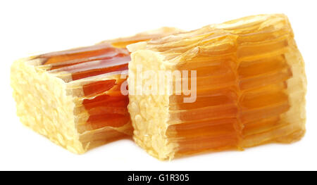 Honey comb su sfondo bianco Foto Stock