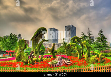 Vista delle figure nel Parco di Huangpu - Shanghai, Cina Foto Stock