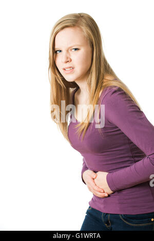 Ragazza ha dolore addominale isolato su bianco Foto Stock