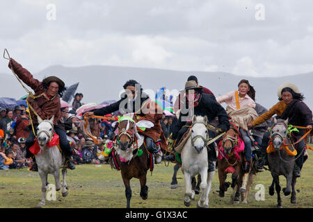 Corse di cavalli di Litang Foto Stock