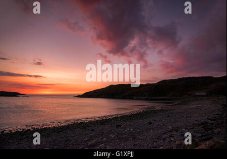 Bel tramonto sulla spiaggia di Scourie in Sutherland, Scotland Regno Unito Foto Stock