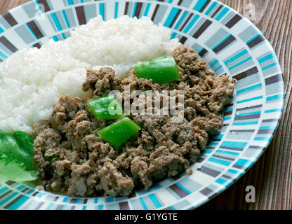 Picadillo a la habanera .Cuba Cocina - La carne macinata con riso su il cubano Foto Stock