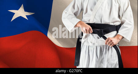 Immagine composita della sezione intermedia del fighter di serraggio della cinghia di karate Foto Stock