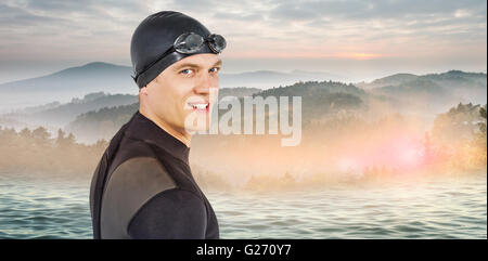 Immagine composita di close-up di fiduciosa nuotatore in neoprene Foto Stock