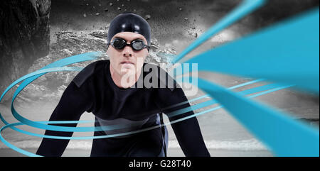 Immagine composita del nuotatore fiducioso in neoprene Foto Stock