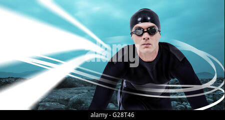Immagine composita del nuotatore fiducioso in neoprene Foto Stock
