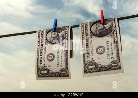 Due dollari americani essiccazione su stringa con sky e gli alberi in background Foto Stock