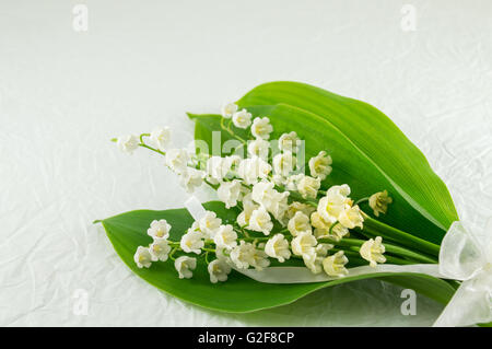 Il giglio della valle bouquet di fiori Foto Stock