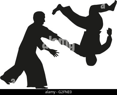 Silhouette di due combattenti aikido Foto Stock