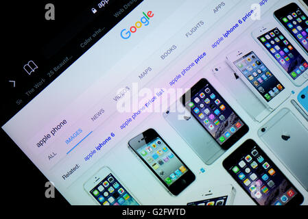 Il browser Internet Explorer che mostra Apple Phone Home page logo visualizzato su uno schermo di Ipad Foto Stock
