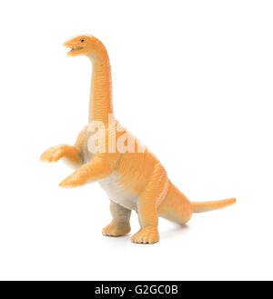 Orange diplodocus toy su sfondo bianco Foto Stock