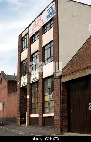 Gun makers fabbrica nel prezzo Street, Quartiere di pistola, Birmingham, Regno Unito Foto Stock