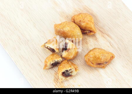 Close up di sbuffi di Curry su legno Foto Stock