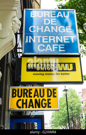 Bureau de Change e Western Union segni in Londra, Regno Unito Foto Stock