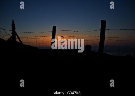 Sun giù a Bull Bay, Anglesey Foto Stock