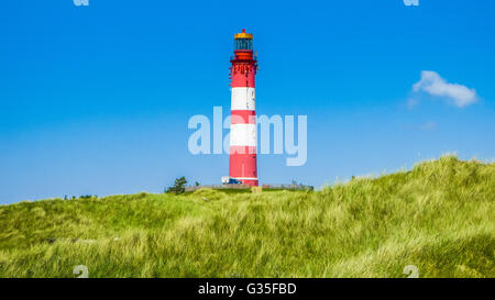 Bellissimo paesaggio di dune con tradizionale faro sull isola di Amrum a mare del Nord Foto Stock
