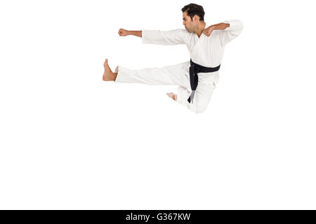 Fighter eseguendo il karate posizione Foto Stock