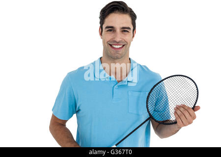 Ritratto di badminton player holding badminton racchetta Foto Stock