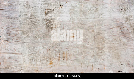 Texture di sfondo di dirty grungy tavola di compensato con graffi e crepe. Foto Stock