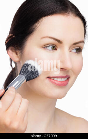 Donna Gorgeous applicare trucco Foto Stock