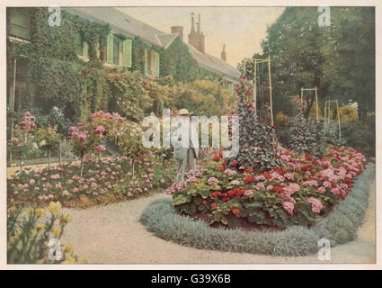 CLAUDE MONET artista francese nel suo giardino a Giverny data: 1840 - 1926 Foto Stock