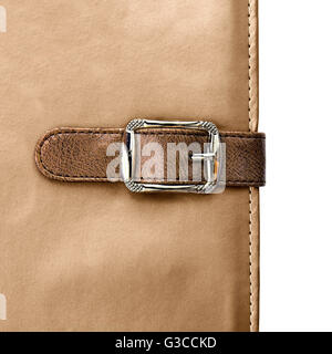Notebook closeup con fibbia nella forma di una cinghia di cuoio Foto Stock
