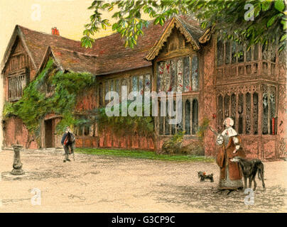 Illustrazione di Cecil Aldin, vecchie case padronali -- Ockwells Manor House, un xv secolo di legno a Manor House vicino a Maidenhead, Berkshire. Mostra la parte anteriore della casa con persone e cani. Data: 1923 Foto Stock