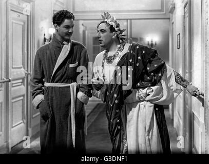 Il Ghost goes West, aka: Gespenst auf Reisen, aka: Ein Gespenst geht nach Amerika, Großbritannien 1935, Regie: René Clair, Darsteller: Robert Donat (links) Foto Stock