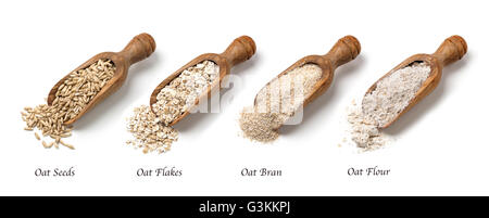Fiocchi di avena, semi e crusca in cucchiai Foto Stock