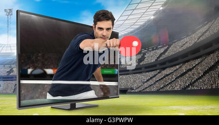 Immagine composita del ritratto di atleta maschio giocando a ping-pong Foto Stock