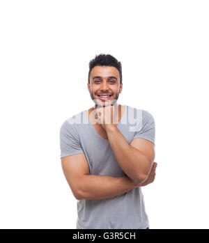 Uomo informale tenere in mano il mento sorridente giovane ragazzo bello Foto Stock