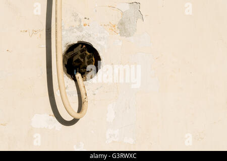 Il vecchio cavo di alimentazione Foto Stock