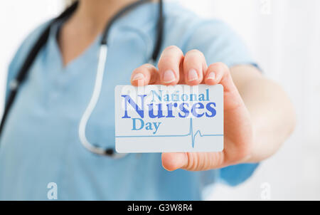 Femmina azienda infermiere infermieri nazionale Giorno della carta Foto Stock