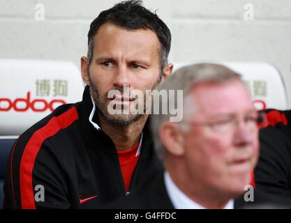 Ryan Giggs (a sinistra) del Manchester United e il direttore Sir Alex Ferguson Foto Stock