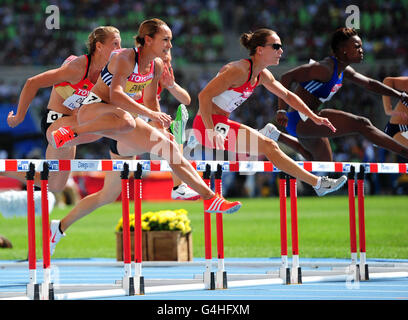 Jessica Ennis della Gran Bretagna vince i 100m Hurdles il primo evento nell'Heptathlon durante il terzo giorno dei Campionati mondiali di atletica IAAF al Daegu Stadium di Daegu, Corea del Sud. Foto Stock