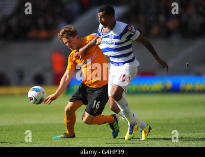 Wolverhampton Wanderers' Christophe Berra (a sinistra) e Queens Park Rangers' Jay Bothroyd Foto Stock